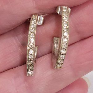 Silver tone hoop earrings with rhinestones